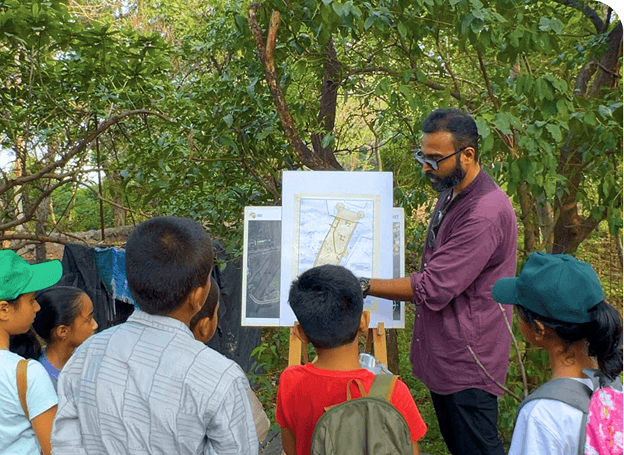 Teacher with children outdoors